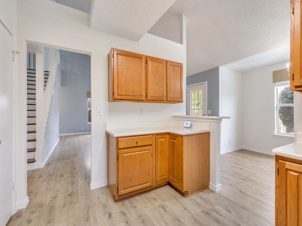 4657 Misty Ridge Drive Fort Worth, TX 76137 - Photo 10 of 25 There is plenty of cabinetry and a pantry for your storage needs !