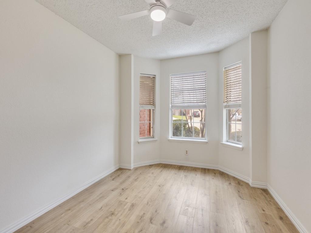4657 Misty Ridge Drive Fort Worth, TX 76137 - Photo 18 of 25 Highlighted by bay windows, the second guest bedroom is approximately 11 x 10 as well !