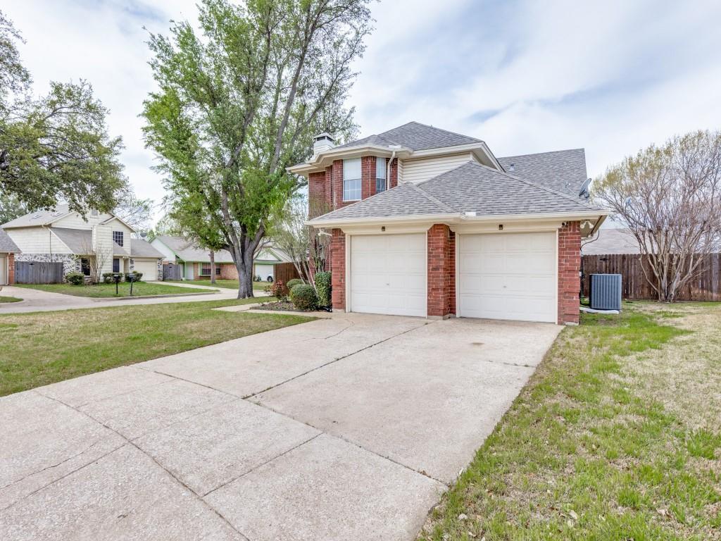 4657 Misty Ridge Drive Fort Worth, TX 76137 - Photo 3 of 25 Another view of the home highlighting the two-car garage !