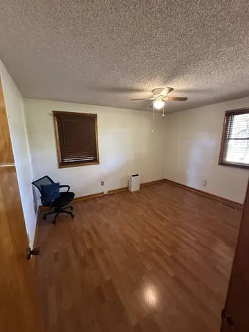 a room with furniture and a window