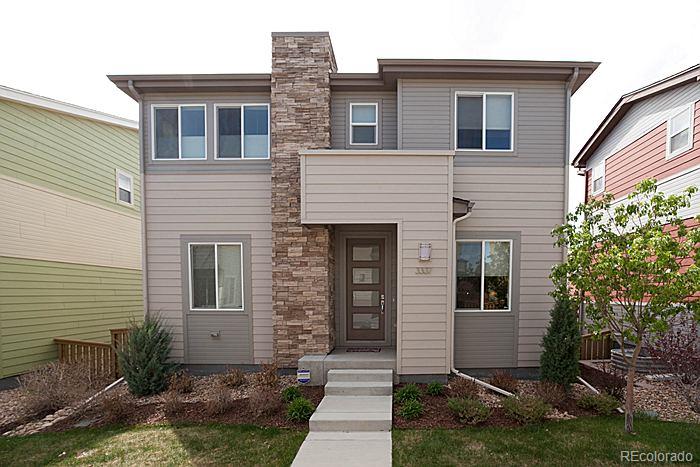 3337 Cranston Circle Highlands Ranch, CO 80126 - Photo 1 of 1 a front view of a house with a yard