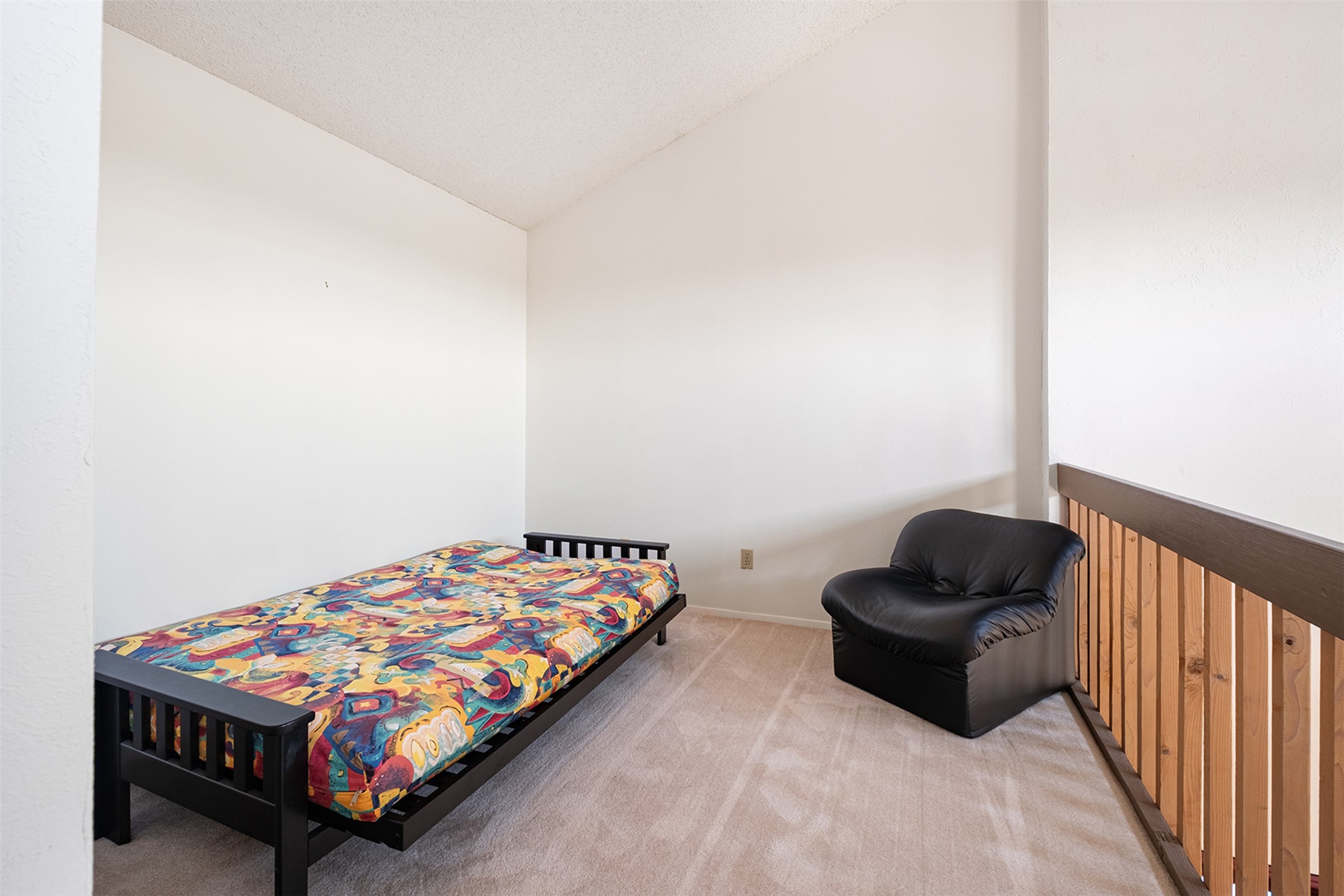 1748 Ohlen Road, Unit 16 Austin, TX 78757 - Photo 23 of 38 Bedroom featuring light carpet