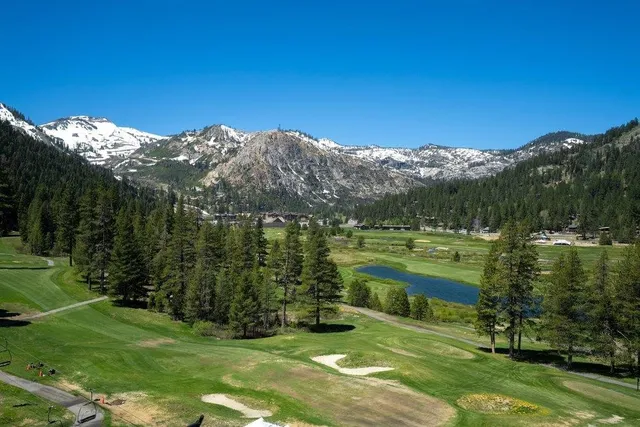 a view of a lake with a mountain in the background