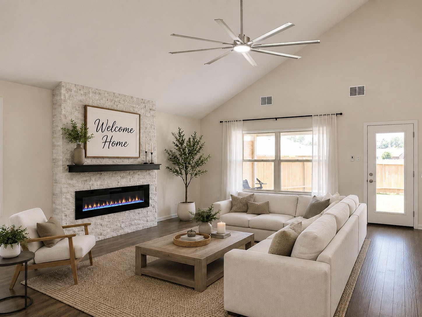 5612 Rainflower Terrace Lane Spring, TX 77389 - Photo 14 of 50 a living room with furniture a fireplace and a window