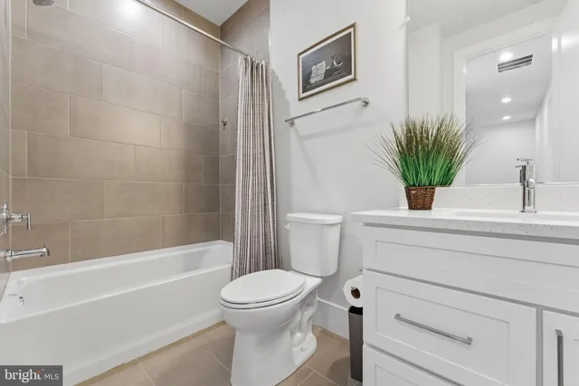 a aerial view of a house with a swimming pool