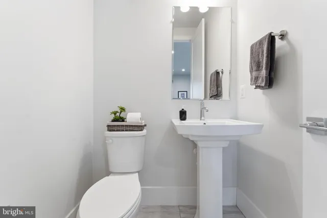 a picture of a bathroom with a shower