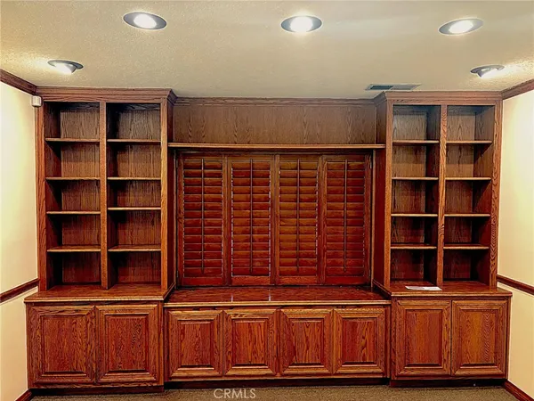 a view of a room with shelves