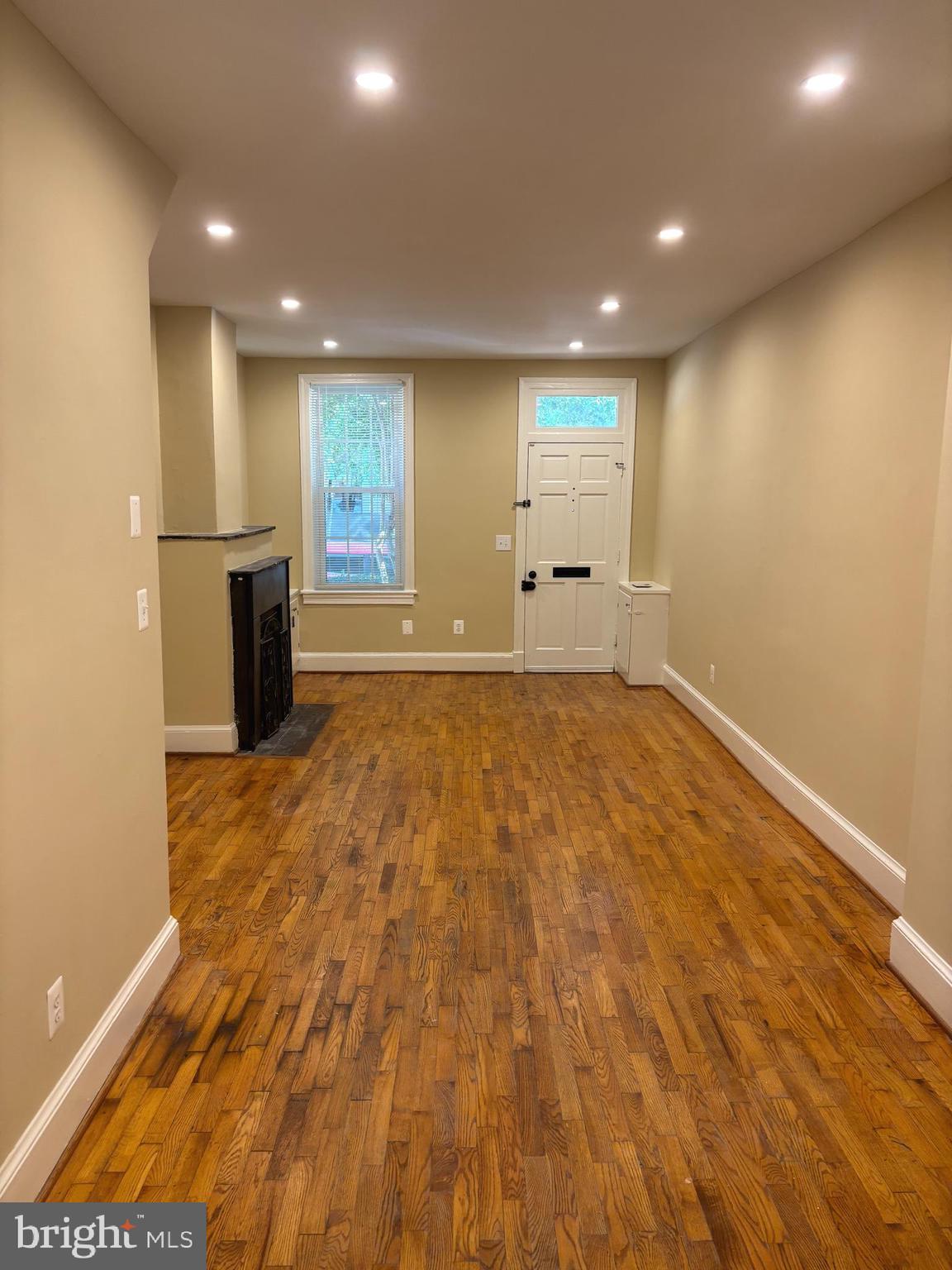 940 24th Street Northwest Washington, DC 20037 - Photo 4 of 12 a view of a big room with wooden floor and windows