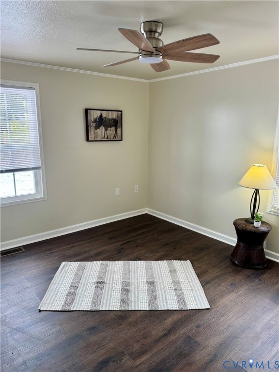 7279 Howerton Road Dunnsville, VA 22454 - Photo 11 of 17 a view of an empty room with wooden floor and a window