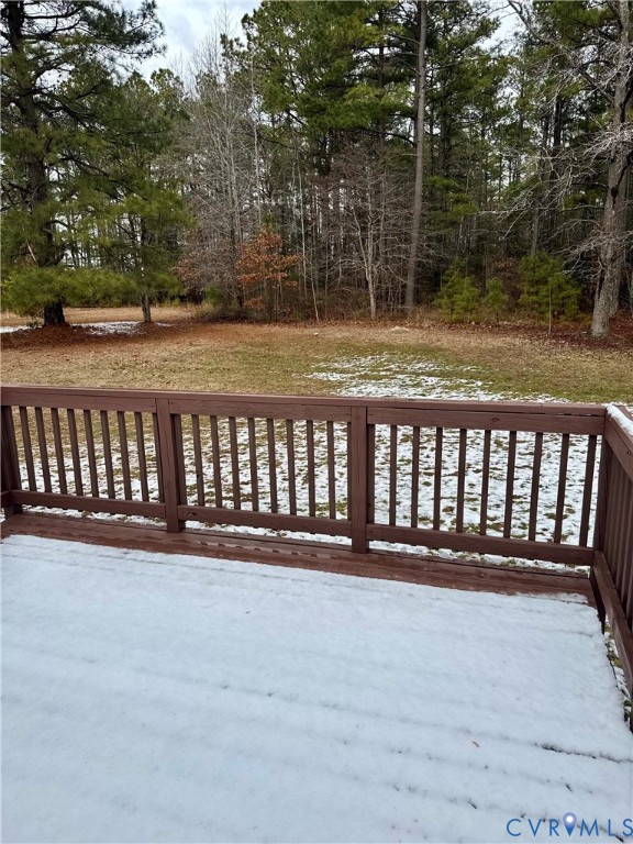 7279 Howerton Road Dunnsville, VA 22454 - Photo 15 of 17 a view of wooden deck