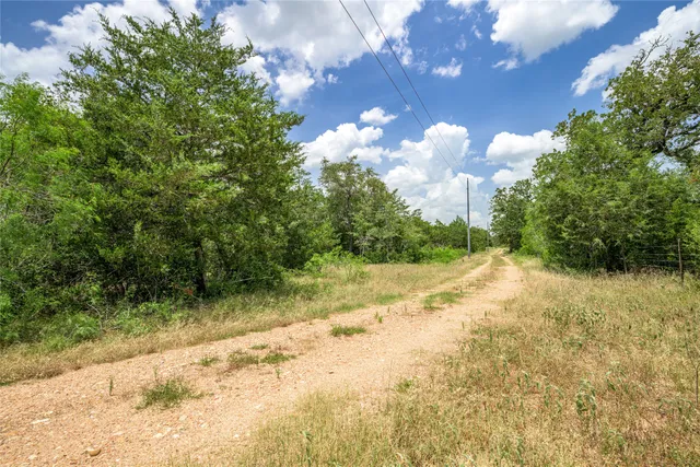 a view of a yard with an outdoor space