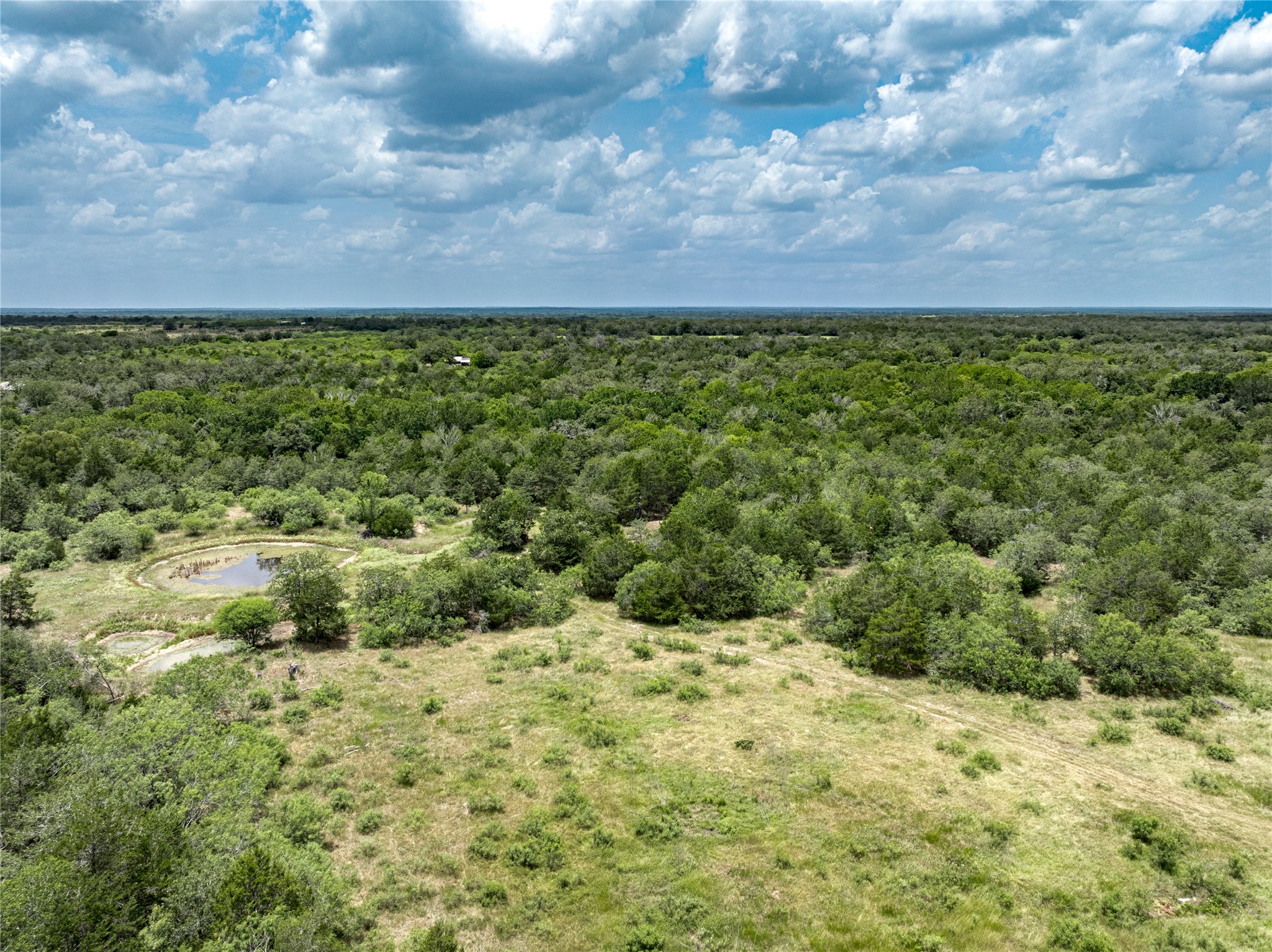5850 Brown Road Flatonia, TX 78941 - Photo 9 of 12 a view of a yard with an outdoor space