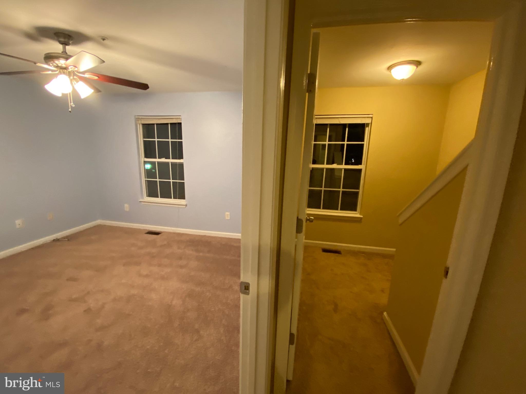 120 Langdon Farm Circle Odenton, MD 21113 - Photo 18 of 37 a view of an empty room with a window