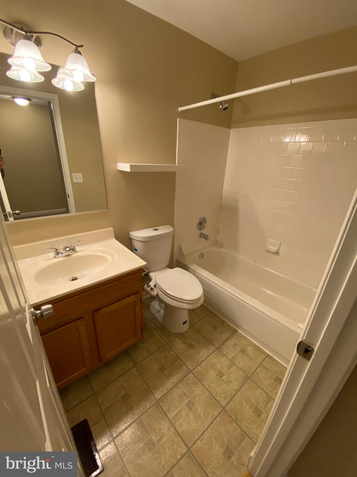 120 Langdon Farm Circle Odenton, MD 21113 - Photo 24 of 37 a bathroom with a sink a toilet and shower