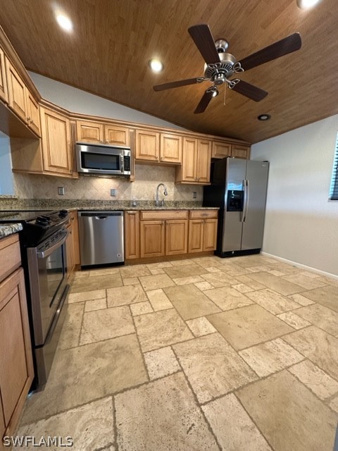 16710 Partridge Place Road, Unit 203 Fort Myers, FL 33908 - Photo 15 of 39 a large kitchen with stainless steel appliances granite countertop a stove top oven a sink a counter space and cabinets