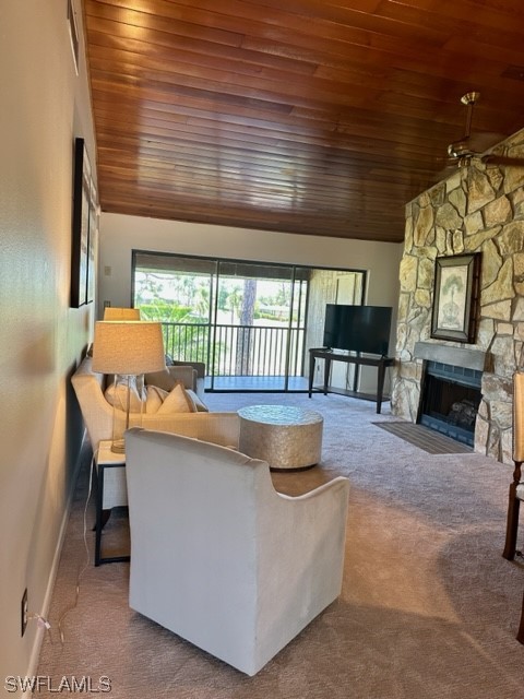 16710 Partridge Place Road, Unit 203 Fort Myers, FL 33908 - Photo 6 of 39 a living room with furniture a fireplace and a table