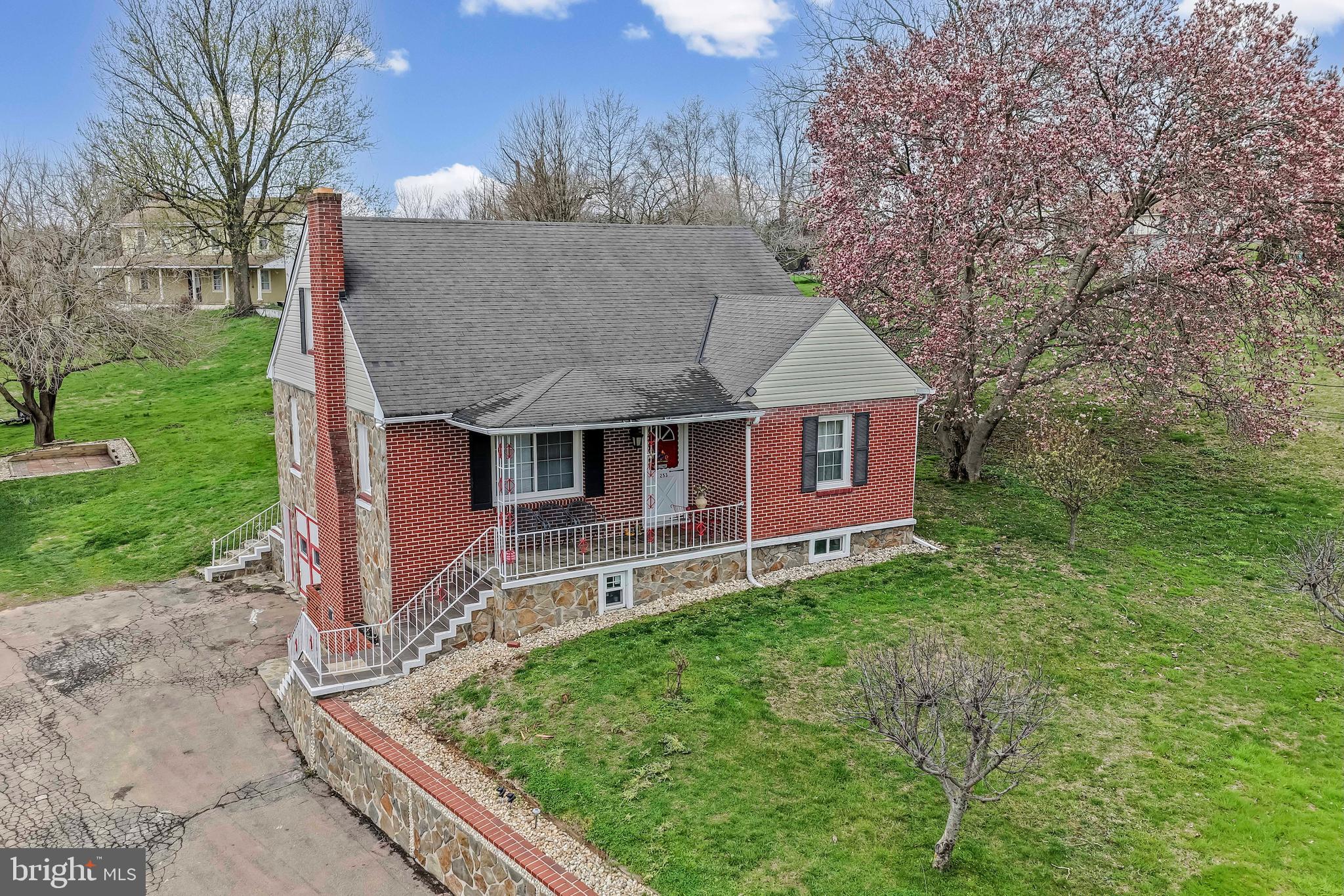 front view of a house with a yard