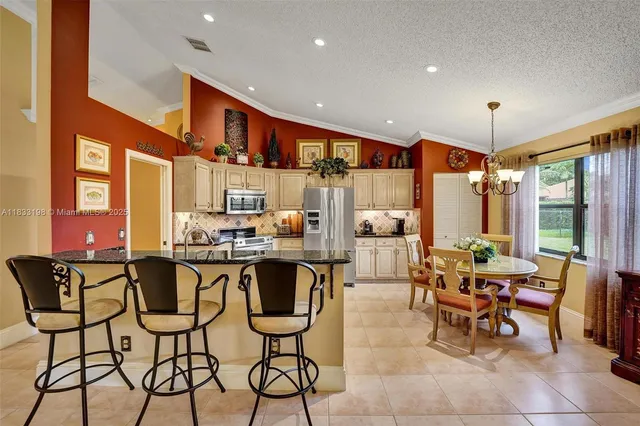 $831,000 | 9215 Southern Orchard Road South, Davie, FL 33328