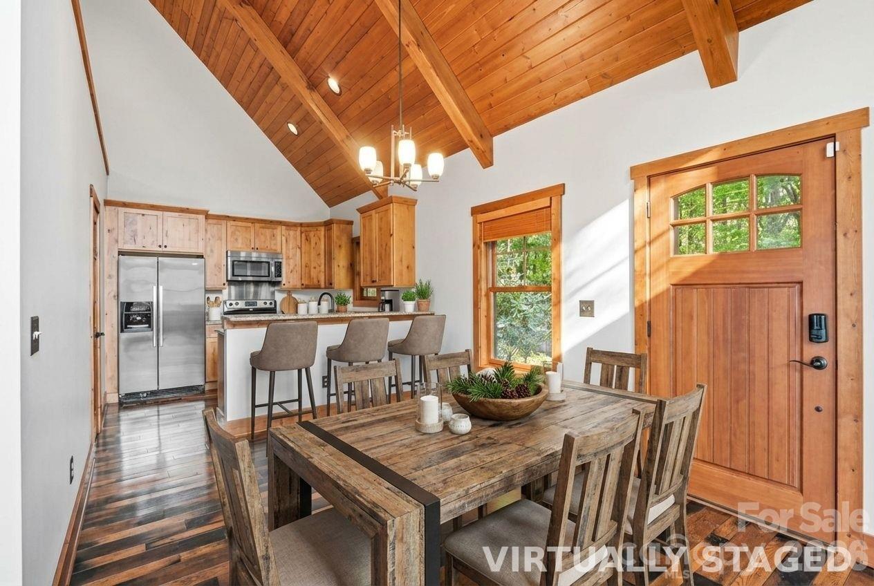 13 Miners Trace Road Burnsville, NC 28714 - Photo 19 of 34 a view of a dining room with furniture window and outside view