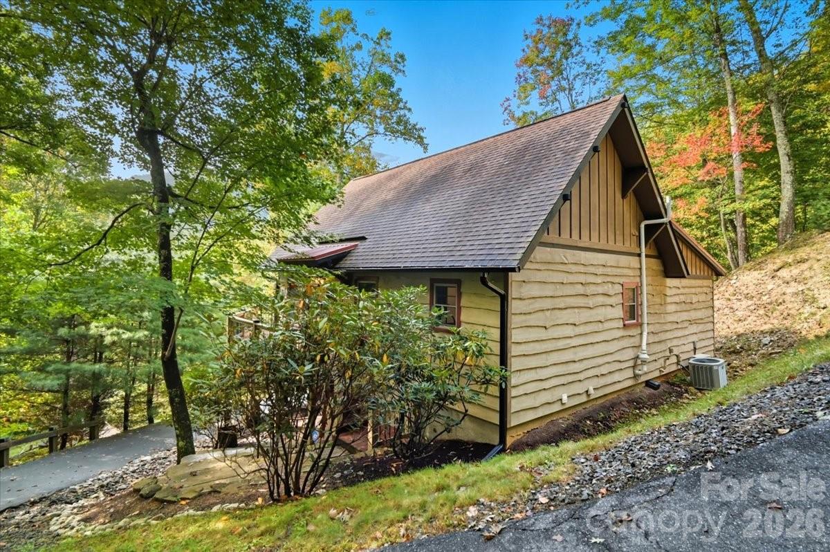 13 Miners Trace Road Burnsville, NC 28714 - Photo 32 of 34 a view of a house with a tree