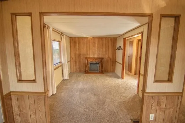 a view of a room with a large window