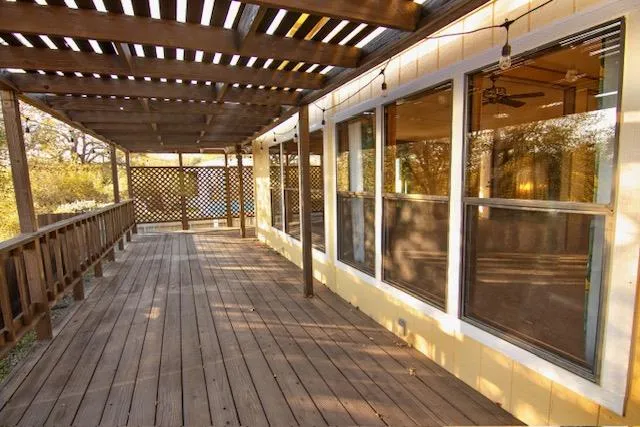 a view of a brick house with many windows