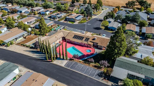 a backyard of a house with a swimming pool