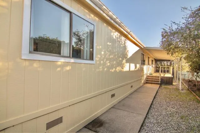 a view of a house with a large window