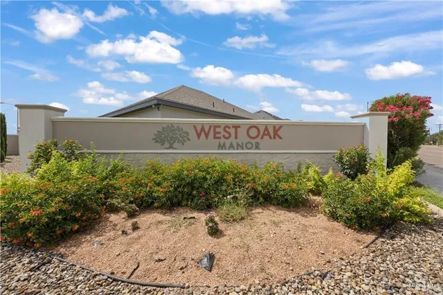 a street sign in front of house