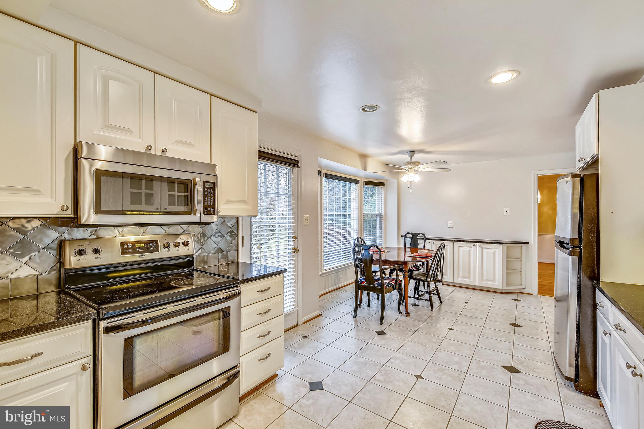 12417 Over Ridge Road Potomac, MD 20854 - Photo 11 of 44 Kitchen with Granite and Stainless