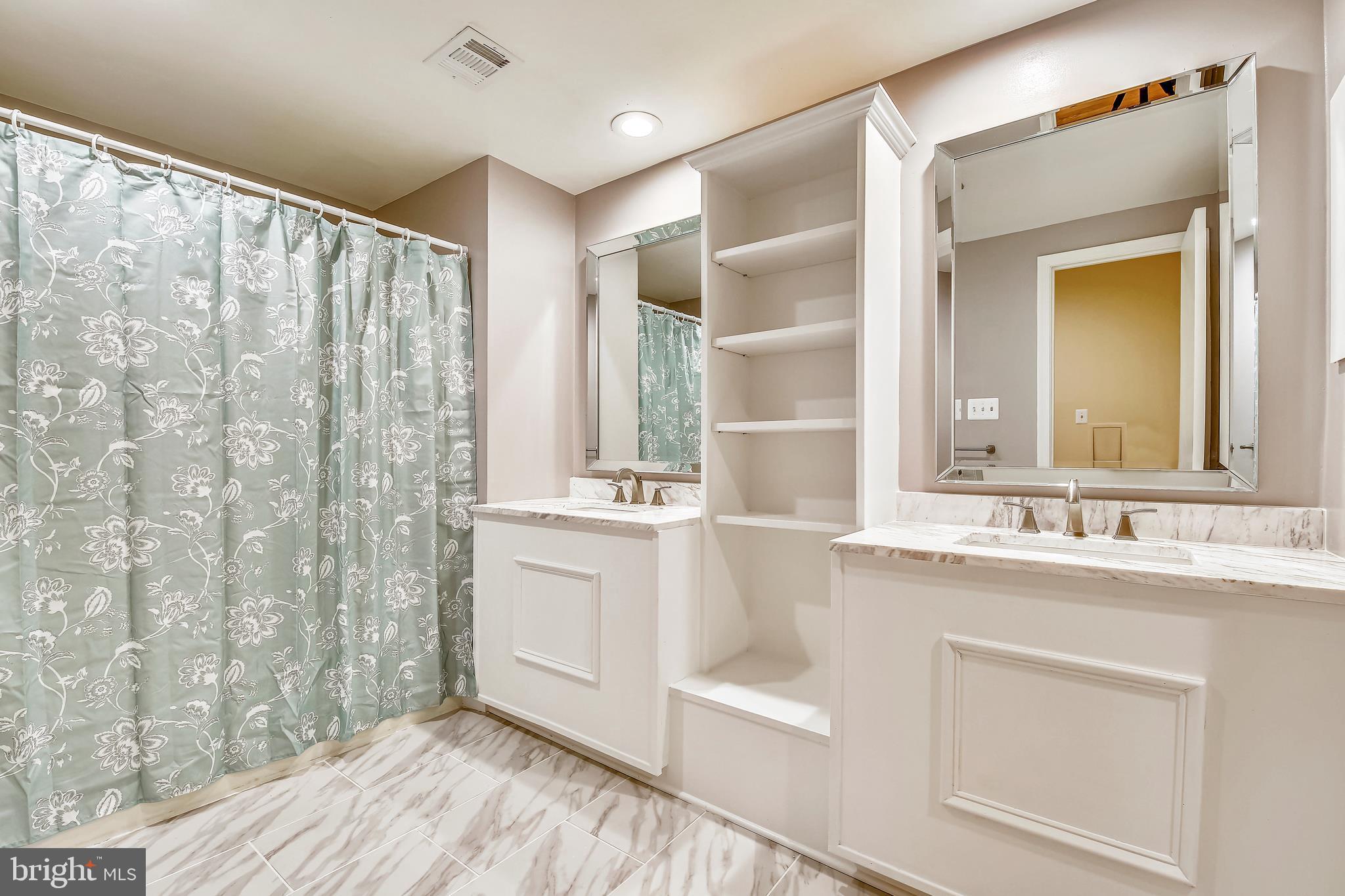 12417 Over Ridge Road Potomac, MD 20854 - Photo 29 of 44 Hall Bathroom 2 with Updated Vanity and Storage