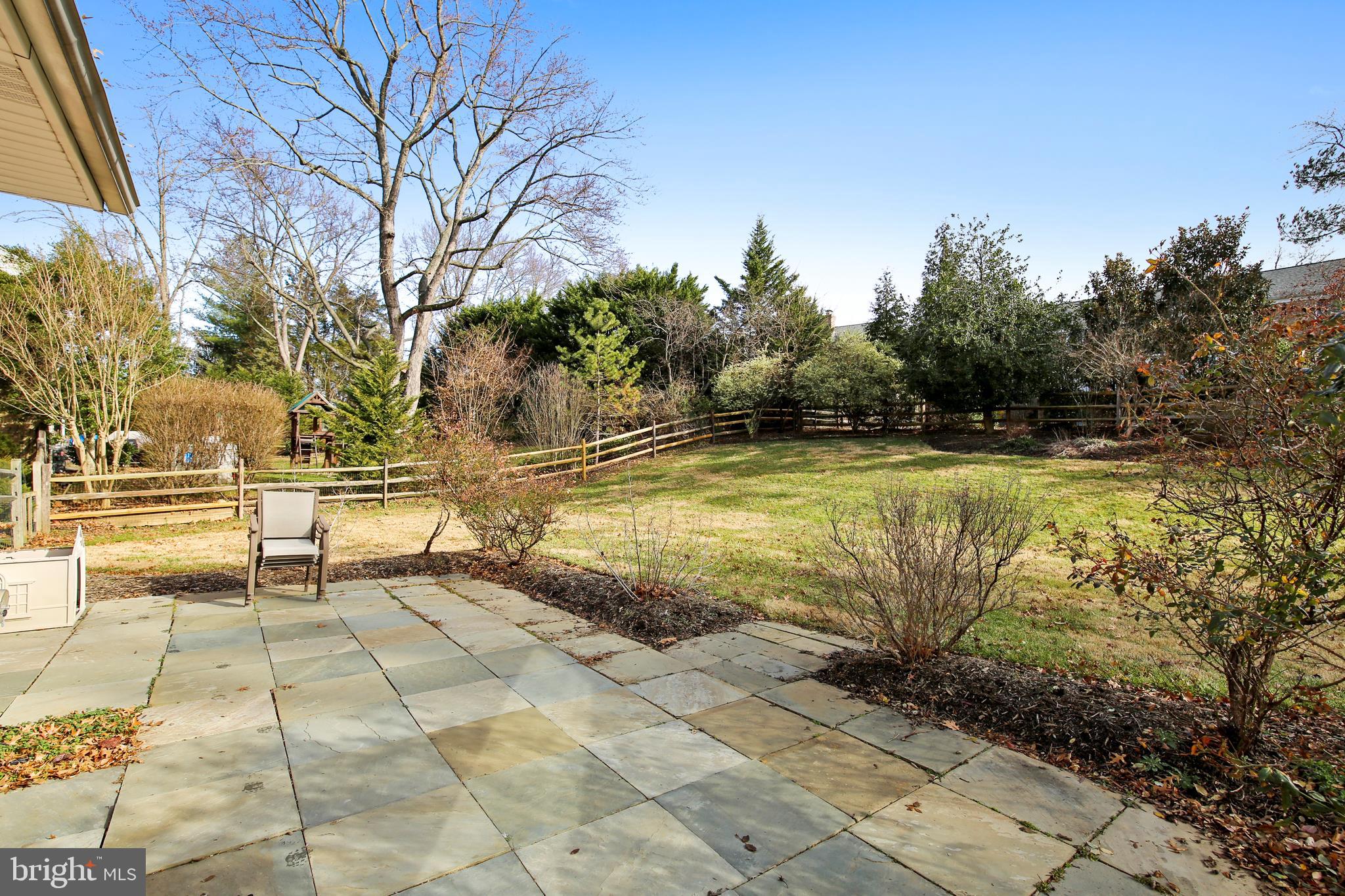 12417 Over Ridge Road Potomac, MD 20854 - Photo 5 of 44 Slate Patio from Kitchen and Family Room