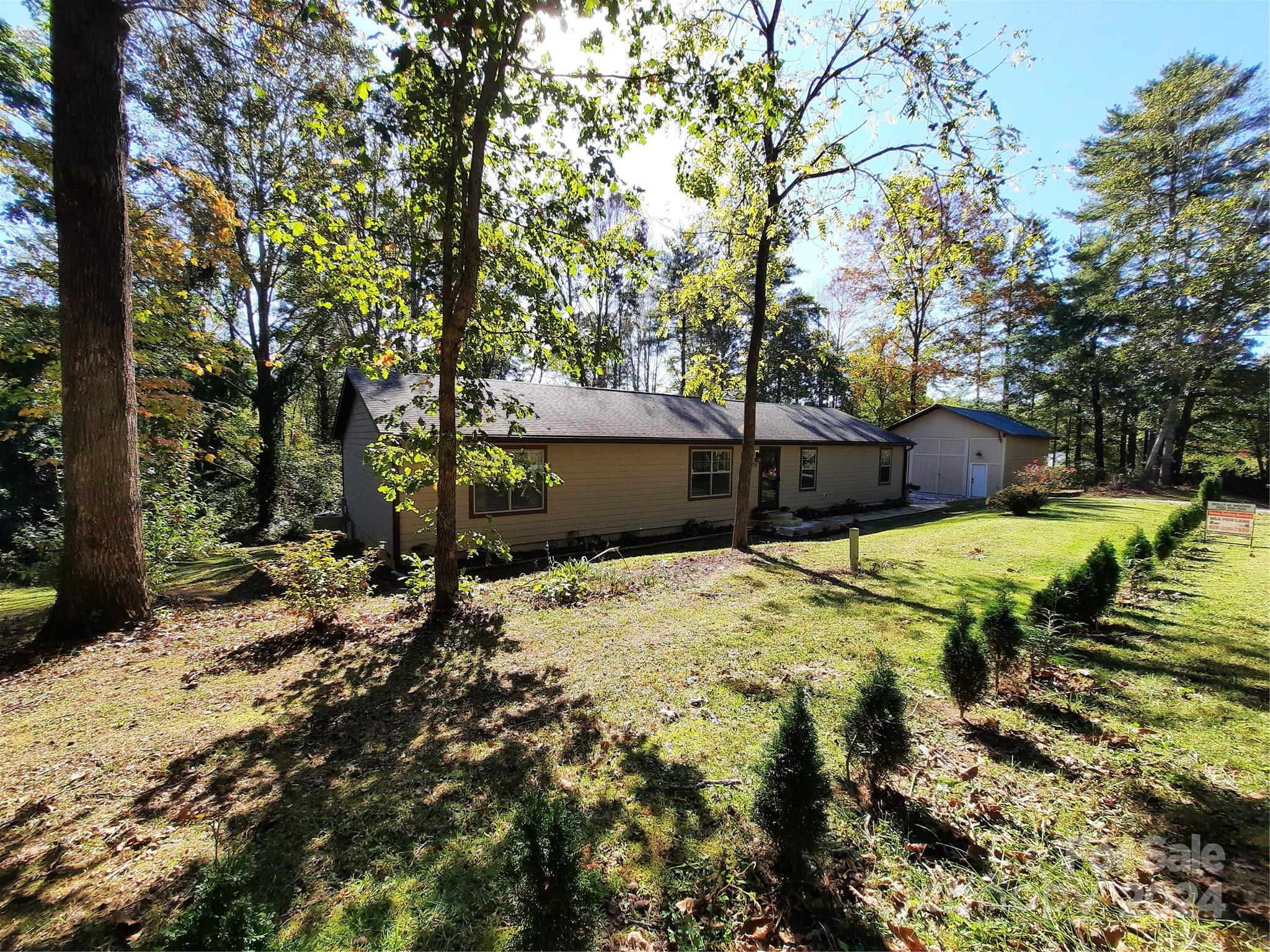 252 Souther Road Fletcher, NC 28732 - Photo 6 of 29 a view of a house with a yard