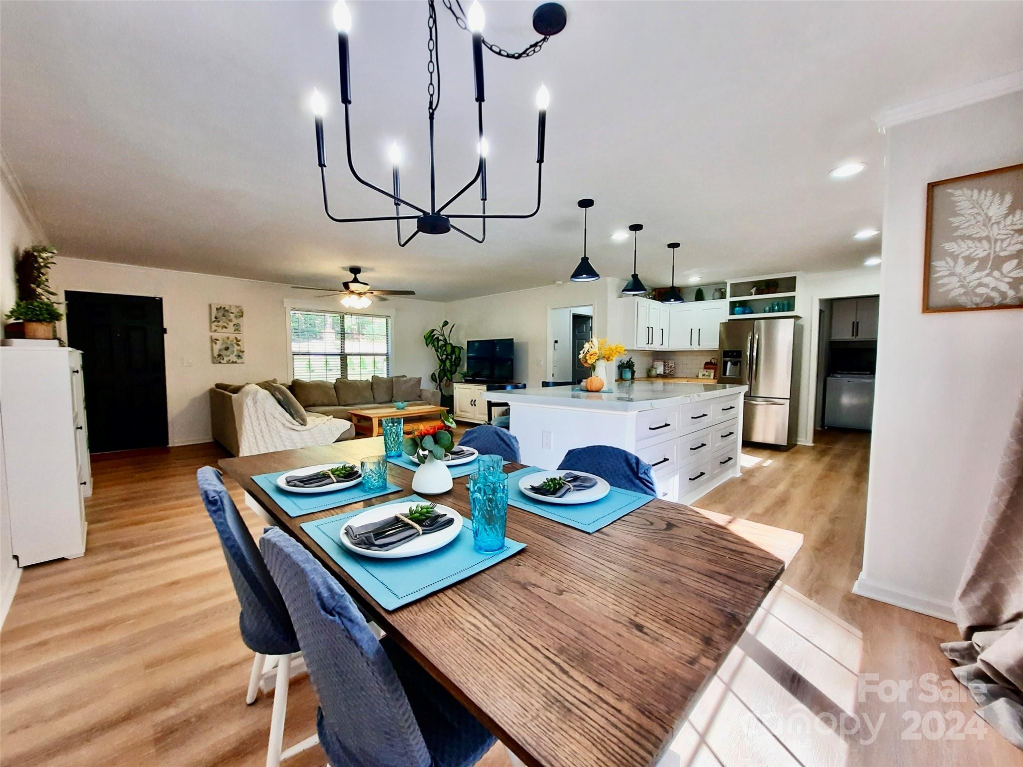 252 Souther Road Fletcher, NC 28732 - Photo 8 of 29 a view of a dining room with furniture and wooden floor