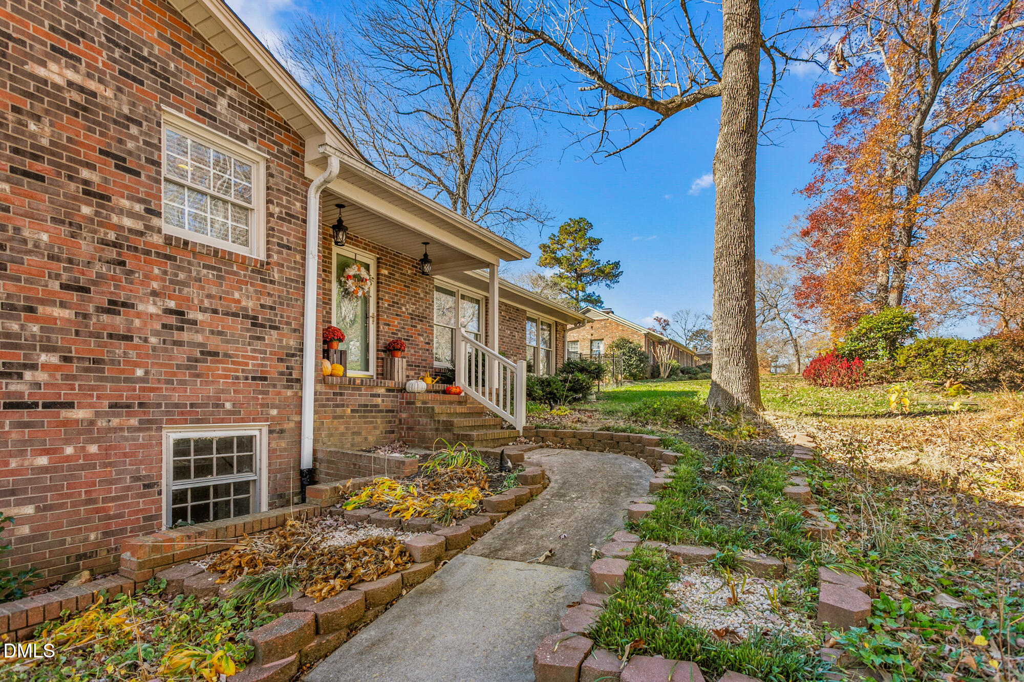 1263 Geneva Albright Road Graham, NC 27253 - Photo 11 of 61 a front view of a house with a yard