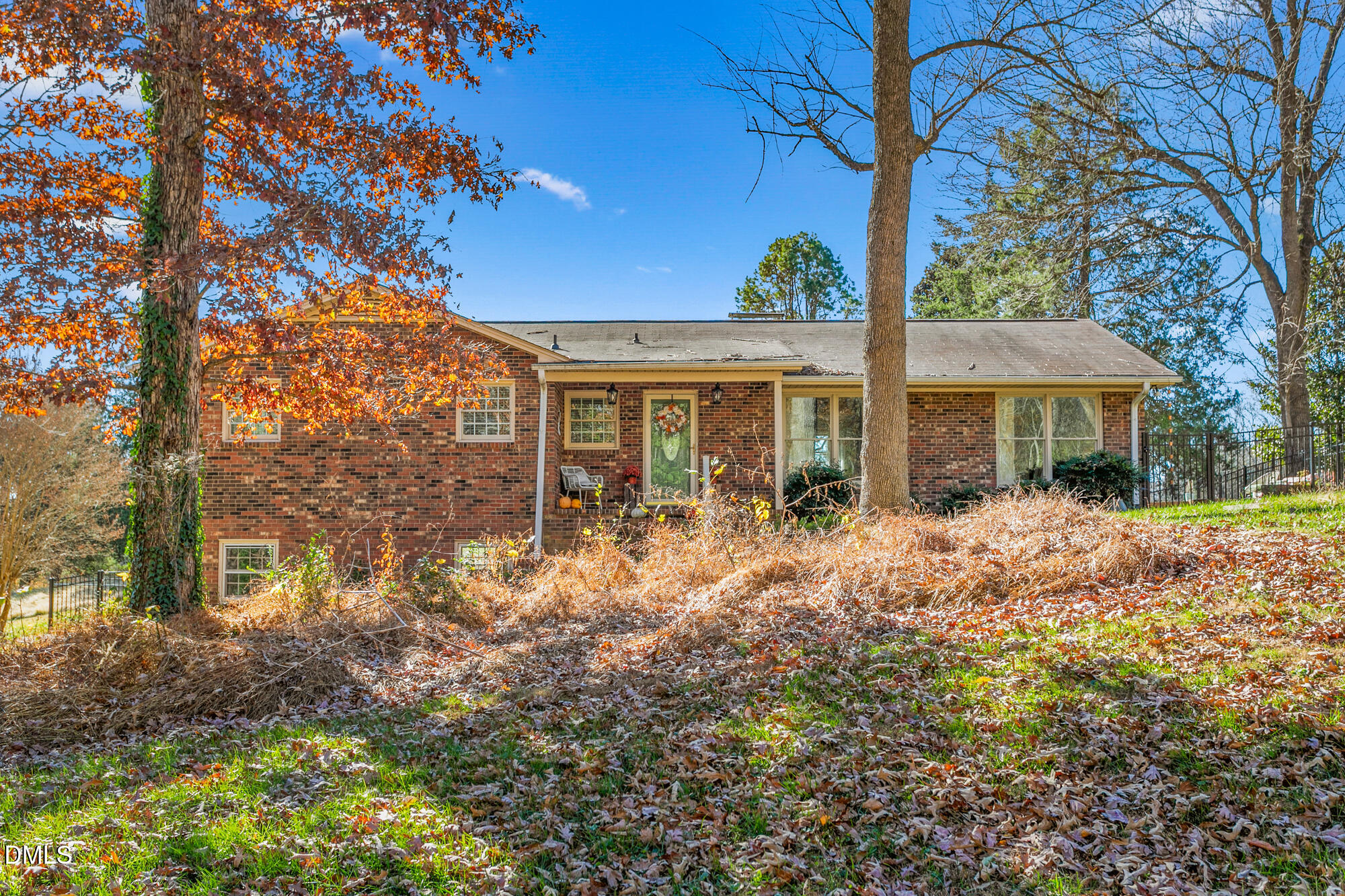 1263 Geneva Albright Road Graham, NC 27253 - Photo 12 of 61 a front view of a house with a yard
