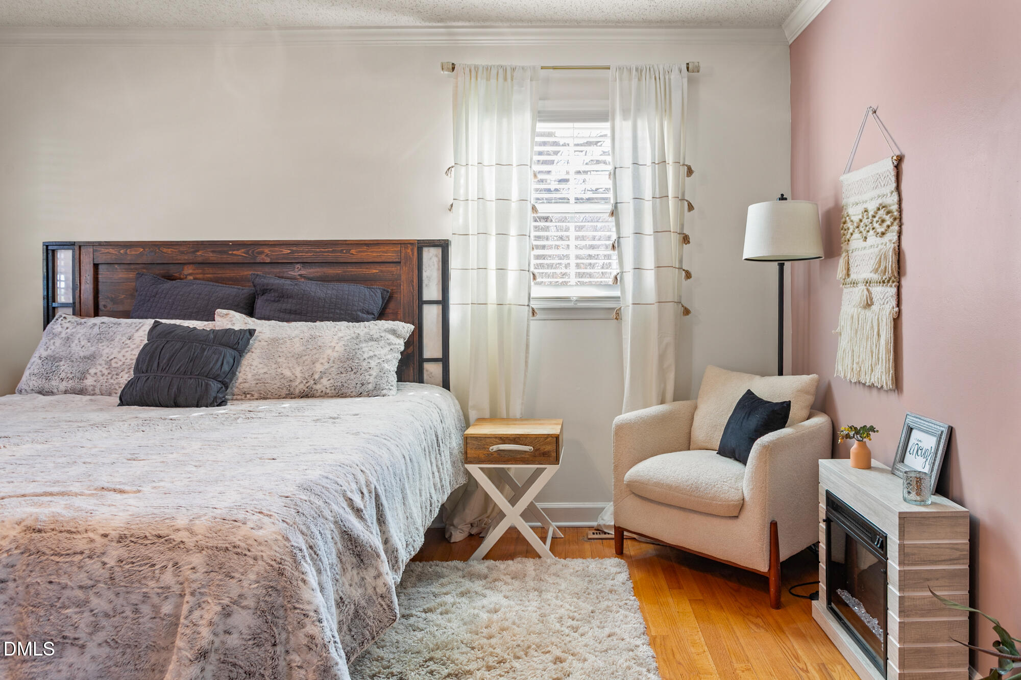 1263 Geneva Albright Road Graham, NC 27253 - Photo 32 of 61 a bedroom with a bed and wooden floor