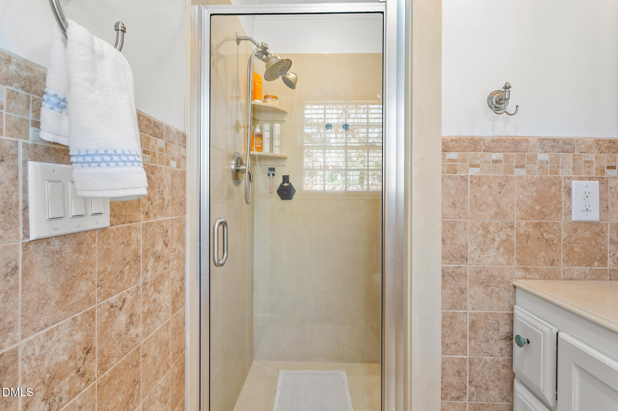 1263 Geneva Albright Road Graham, NC 27253 - Photo 35 of 61 a bathroom with a granite countertop shower mirror and a bathtub