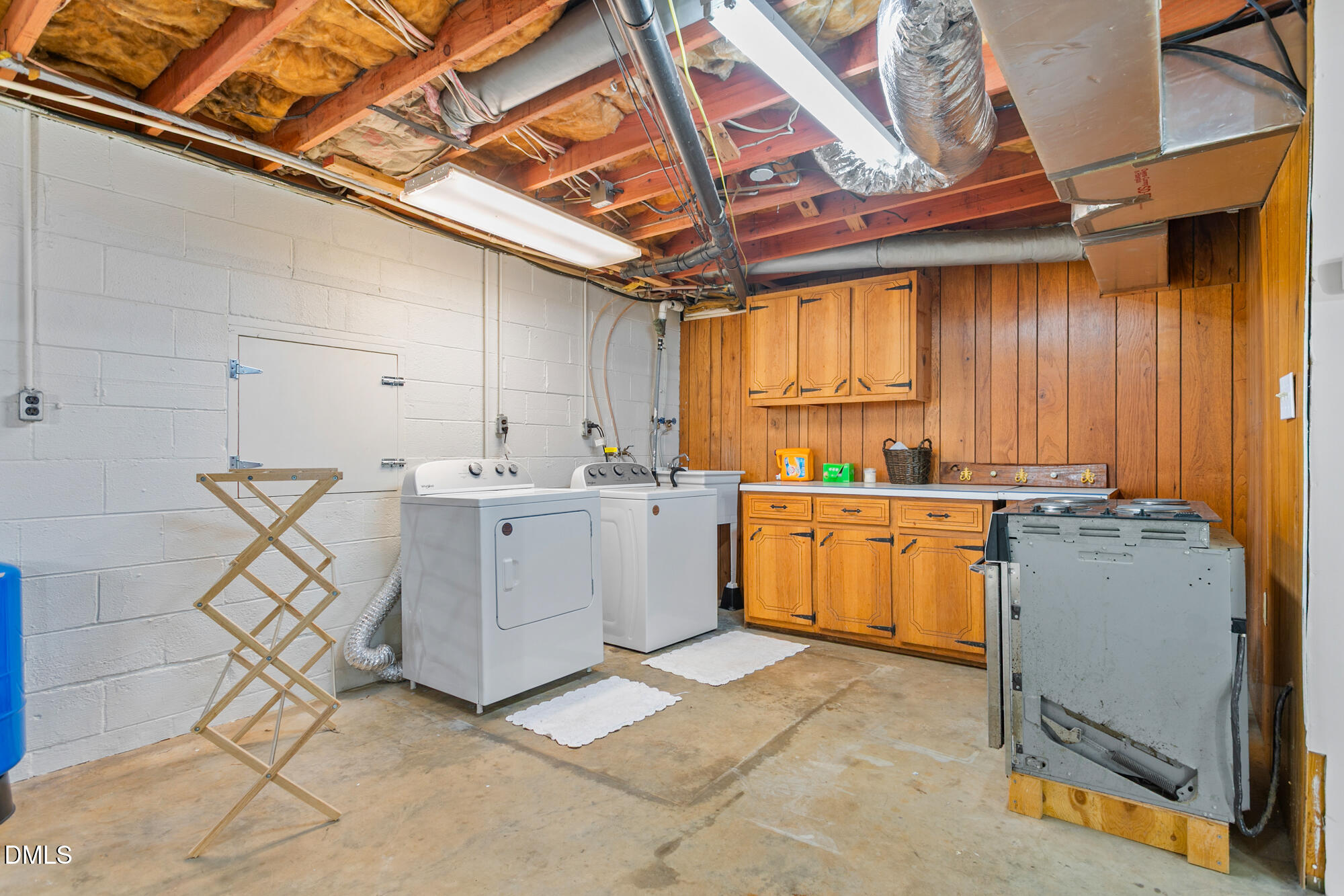 1263 Geneva Albright Road Graham, NC 27253 - Photo 37 of 61 a utility room with cabinets