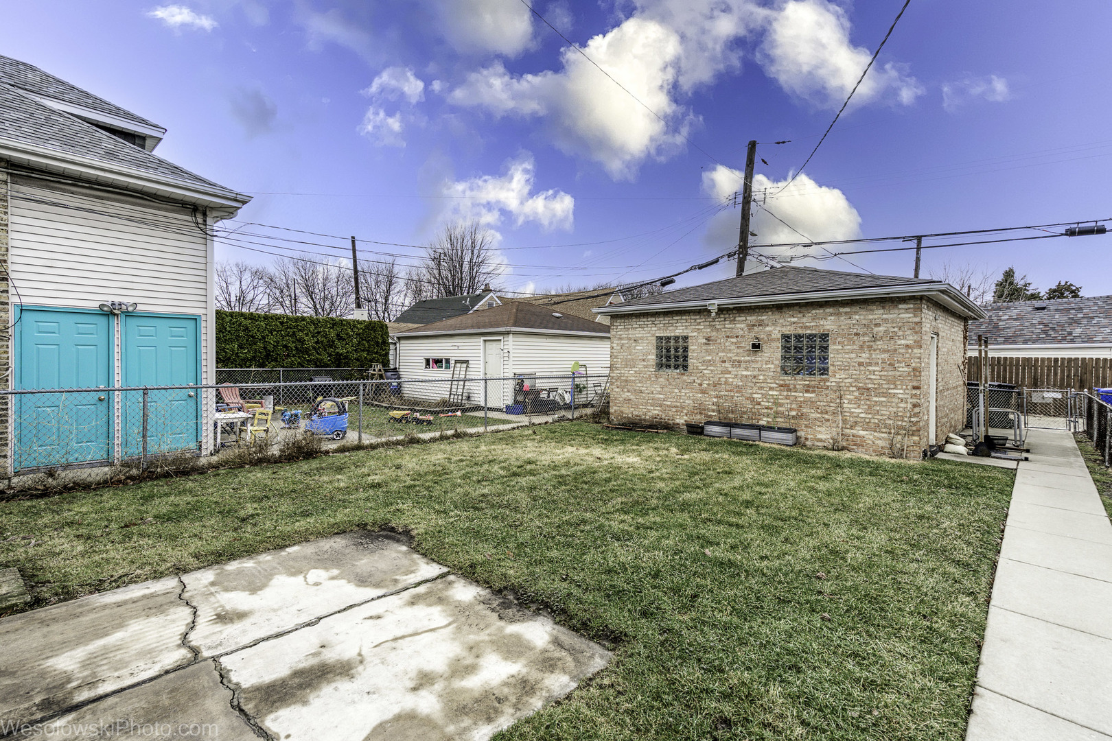 5944 West Foster Avenue Chicago, IL 60630 - Photo 18 of 21 a view of a house with backyard