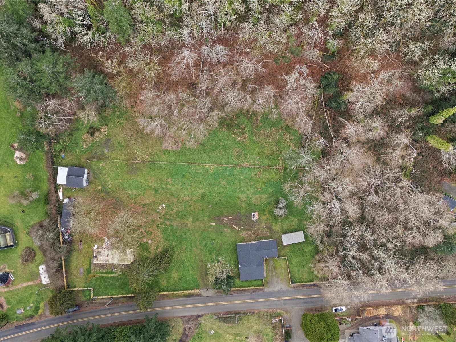 16602-16608 Delano Road Southwest Lakebay, WA 98349 - Photo 34 of 40 an aerial view of a house with outdoor space