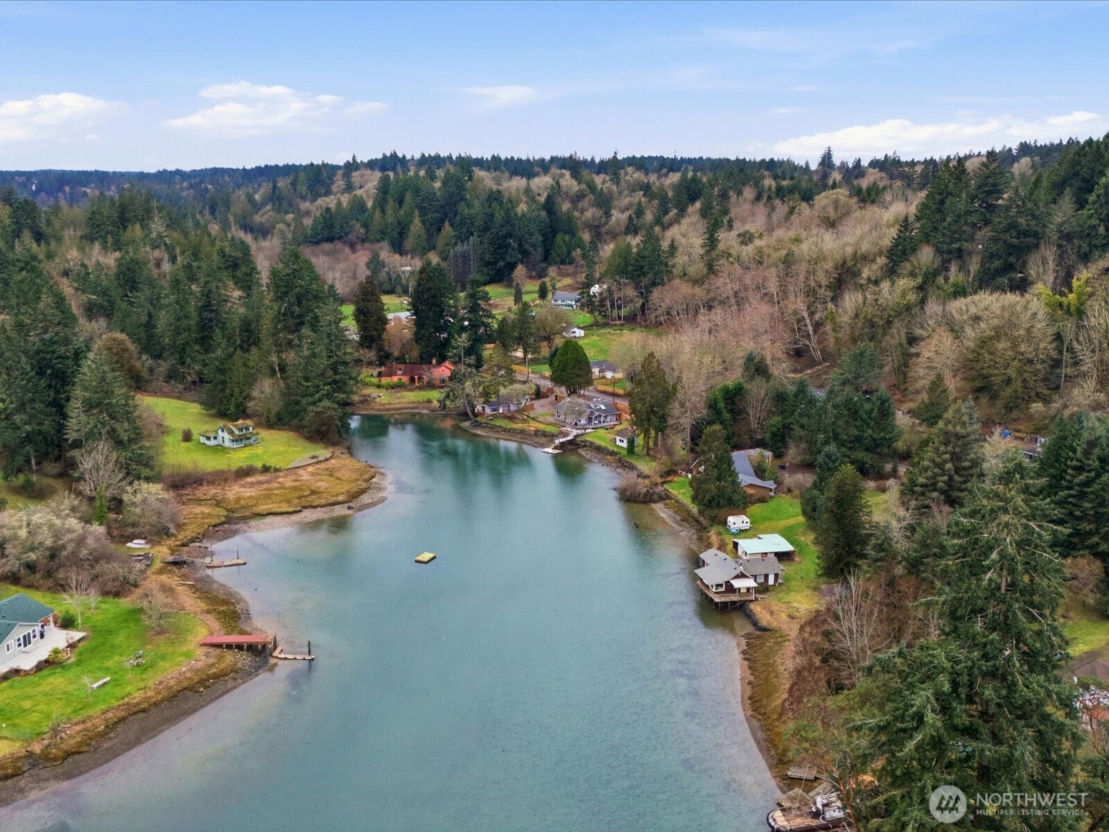 16602-16608 Delano Road Southwest Lakebay, WA 98349 - Photo 37 of 40 an aerial view of a house with a yard lake view and mountain view