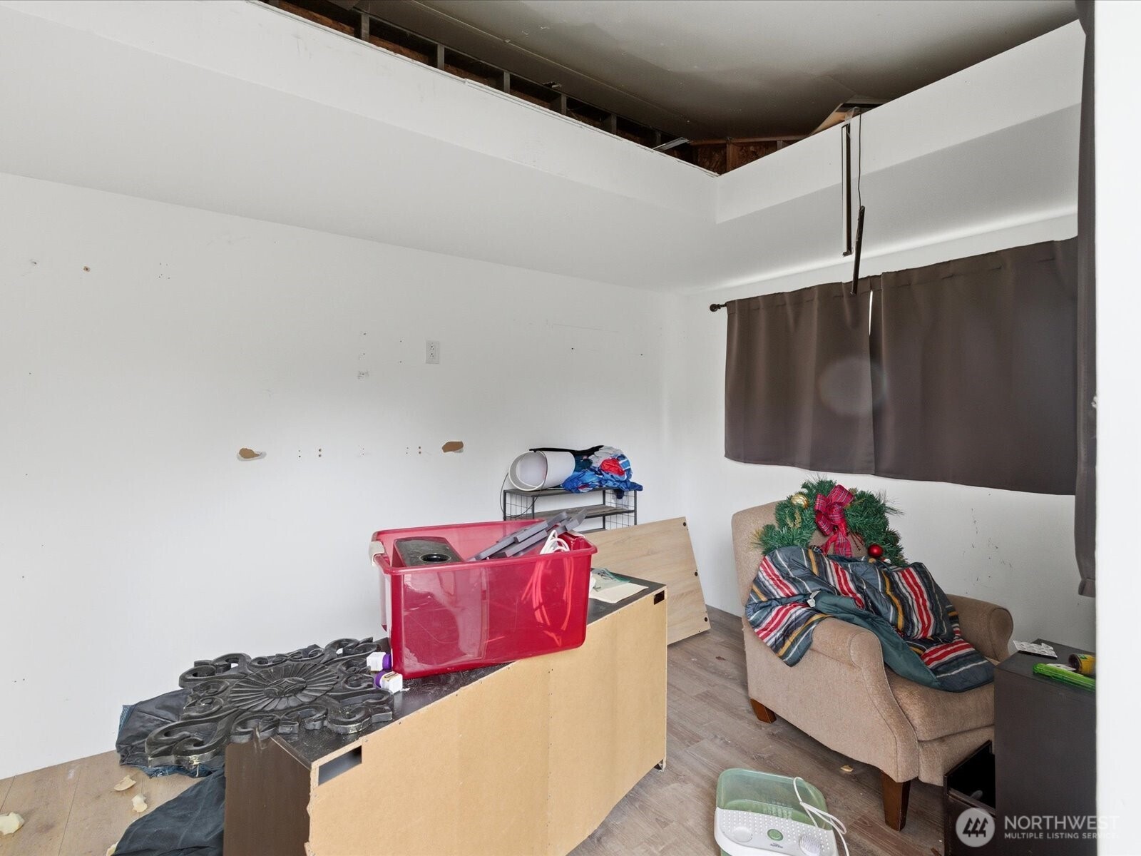 16602-16608 Delano Road Southwest Lakebay, WA 98349 - Photo 7 of 40 a bedroom with a bed and a table