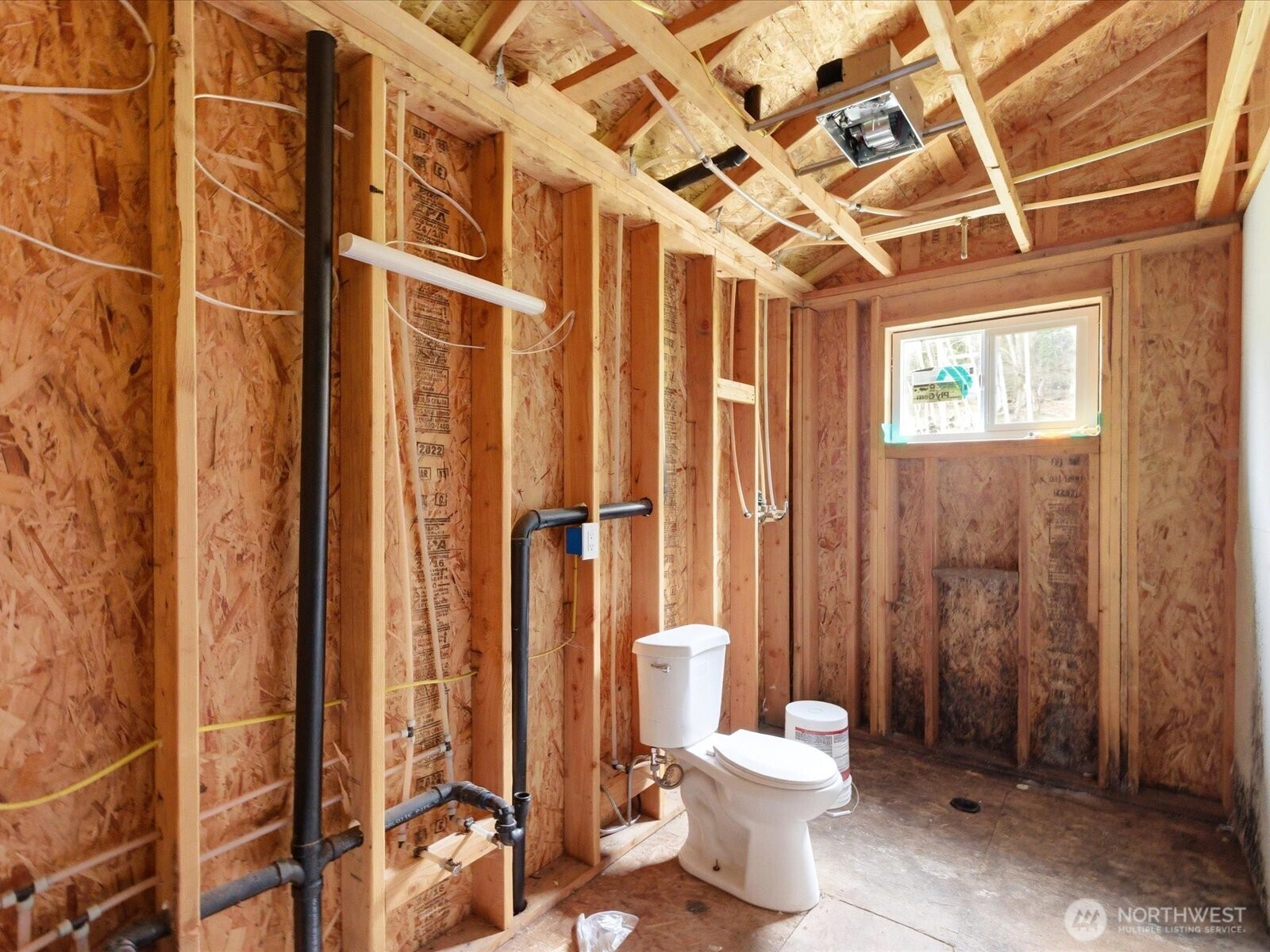 16602-16608 Delano Road Southwest Lakebay, WA 98349 - Photo 9 of 40 a bathroom with a toilet and a shower