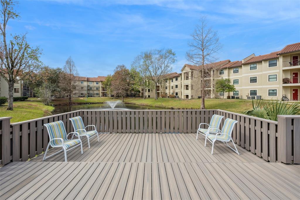 3032 Parkway Boulevard, Unit 305 Kissimmee, FL 34747 - Photo 25 of 40 a view of a chairs on th terrace