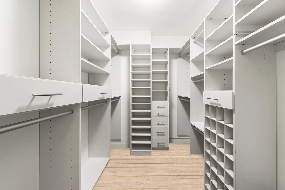 46 Laight Street, Unit PH4 Manhattan, NY 10013 - Photo 9 of 17 a view of walk in closet with empty racks