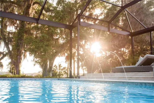 a view of a house with a yard and plants