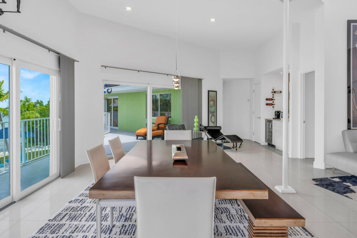108 Sunset Drive Marathon, FL 33050 - Photo 19 of 46 a living room with furniture and a window