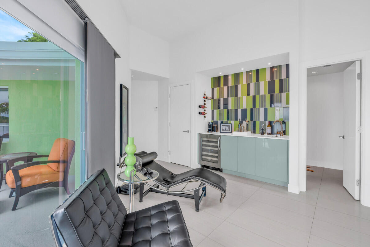 108 Sunset Drive Marathon, FL 33050 - Photo 20 of 46 a living room with furniture and large windows