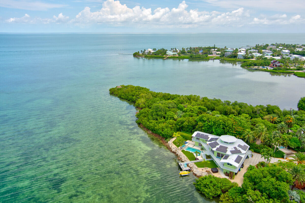 108 Sunset Drive Marathon, FL 33050 - Photo 2 of 46 a view of a lake with outside area